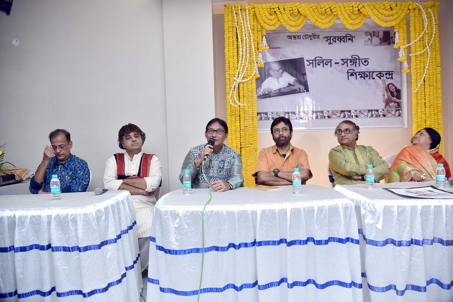 Sri Debashish Basu anchoring the event. Guests are Smt Haimanti Shukla, Sri Kalyan Set Barat, Sri Swapan Basu, Sri Malhar Ghosh & Sri Gautam Ghosh